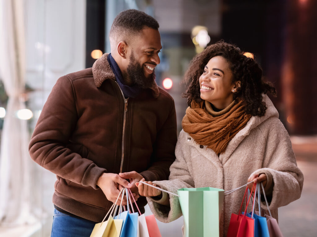 Holiday shoppers are starting early — and buying less